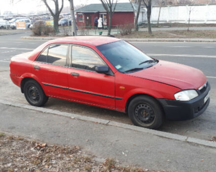 Mazda 323 1999 року - Фото 1 автомобіля