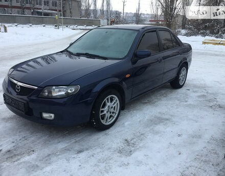 Mazda 323 2003 года