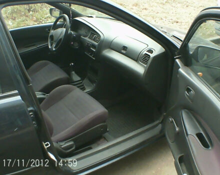 Mazda 323 1995 року - Фото 2 автомобіля