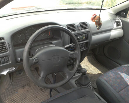 Mazda 323 1997 года - Фото 7 авто