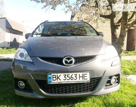 Фото на отзыв с оценкой 4.4 о Mazda 5 2009 году выпуска от автора "Микола" с текстом: В цілому машина як для сім\'ї непогана. Витрати на ТО незначні. Ремонт відносно не дорогий. З мін...