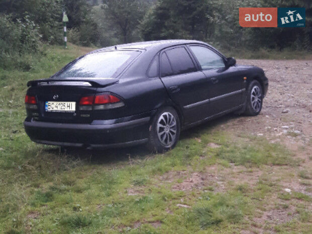 Мазда 626 1999 року Mazda 626 1999 року