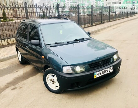 Mazda Demio 1999 года