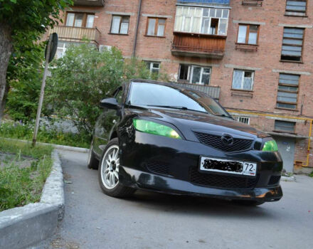 Mazda Demio 2004 року - Фото 1 автомобіля