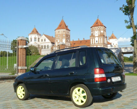 Mazda Demio 1999 года