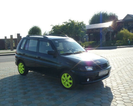 Mazda Demio 1999 року - Фото 2 автомобіля