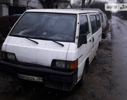 Фото на отзыв с оценкой 3.8 о Mitsubishi L 300 пасс. 1992 году выпуска от автора "Руслан" с текстом: Машина очень удобная. Был низкий и короткий.Размер с легковушку но впихнуть можно невероятное кол...