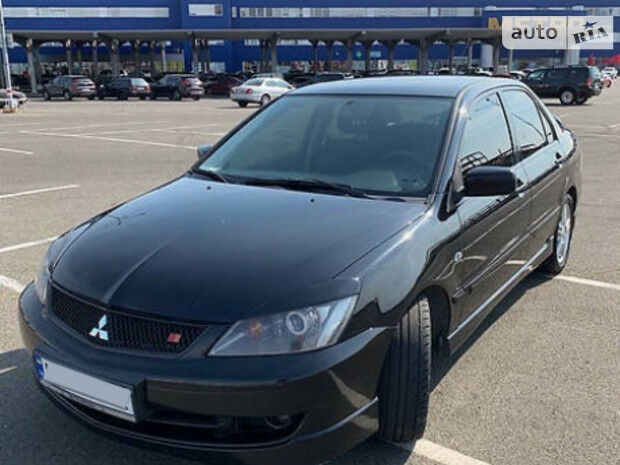 Мицубиси Лансер 2006 года Mitsubishi Lancer 2006 года