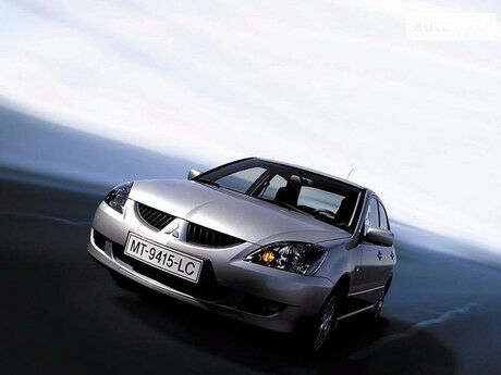 Мицубиси Лансер 2003 года Mitsubishi Lancer 2003 года