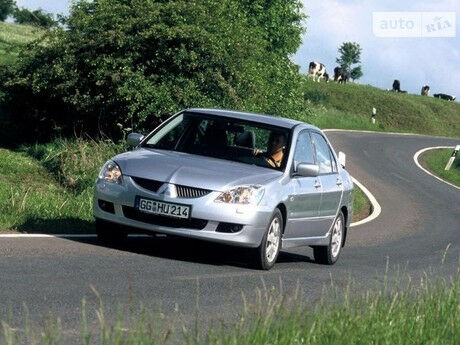 Мицубиси Лансер 2002 года Mitsubishi Lancer 2002 года
