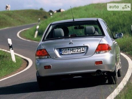 Мицубиси Лансер 2001 года Mitsubishi Lancer 2001 года