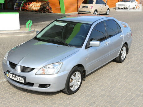 Мицубиси Лансер 2004 года Mitsubishi Lancer 2004 года