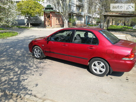 Мицубиси Лансер 2004 года Mitsubishi Lancer 2004 года