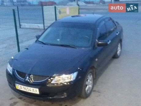 Мицубиси Лансер 2004 года Mitsubishi Lancer 2004 года