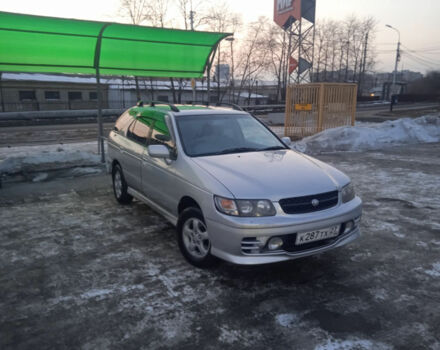 Nissan R'nessa 1998 року - Фото 10 автомобіля