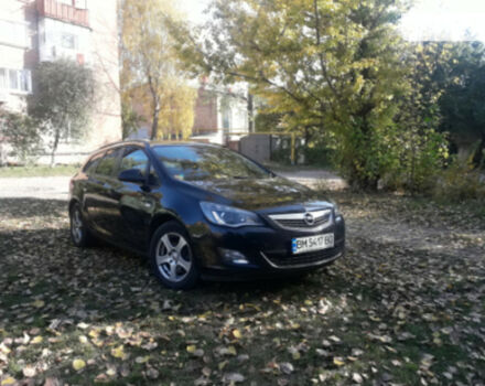 Opel Astra J 2011 года