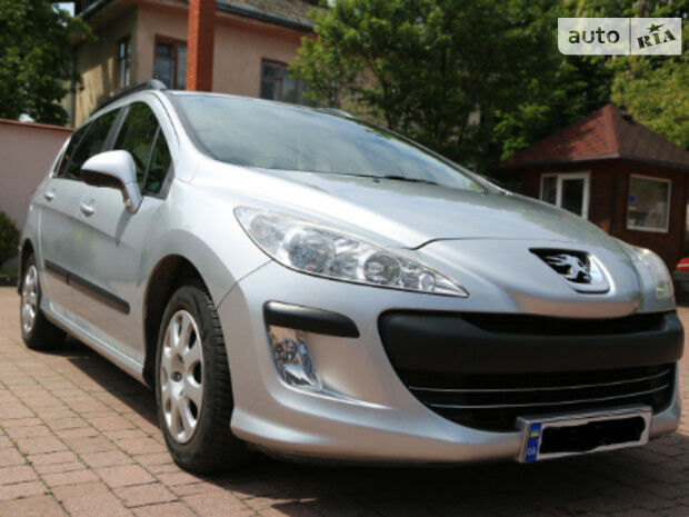 Peugeot 308 SW 2011 року