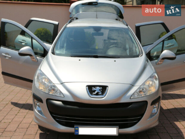 Peugeot 308 SW 2011 года