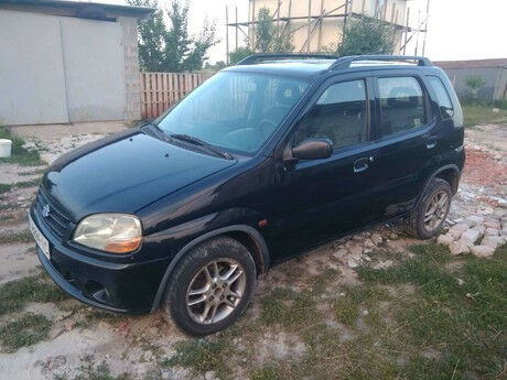 Сузуки Игнис 2003 года Suzuki Ignis 2003 года