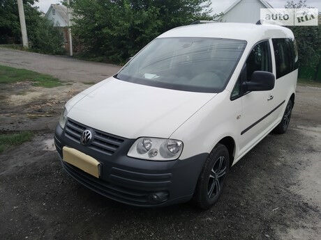 Volkswagen Caddy пасс. 2009 року