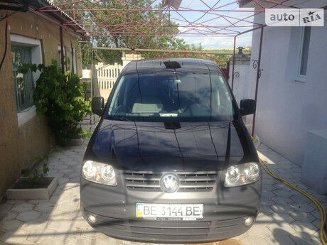 Volkswagen Caddy пасс. 2010 року