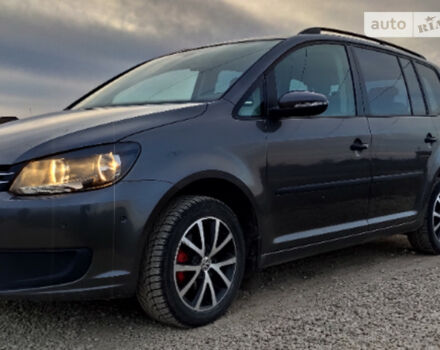 Volkswagen Touran 2011 года - Фото 2 авто