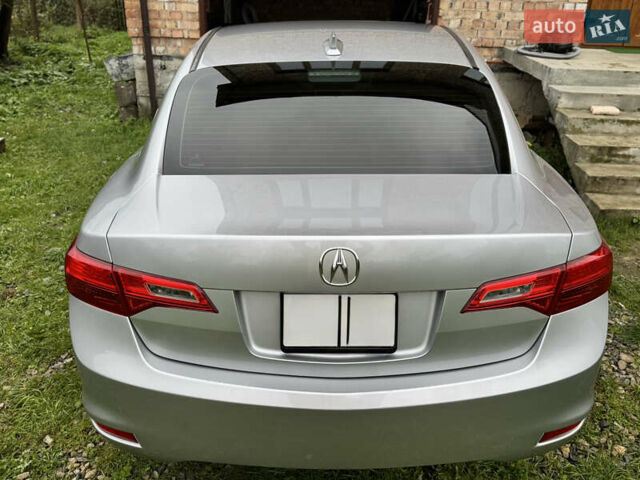 Сірий Акура ІЛХ, об'ємом двигуна 2 л та пробігом 125 тис. км за 9950 $, фото 1 на Automoto.ua
