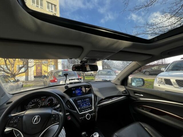 Белый Акура МДХ, объемом двигателя 3.5 л и пробегом 245 тыс. км за 17500 $, фото 1 на Automoto.ua