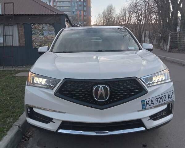 Белый Акура МДХ, объемом двигателя 3.47 л и пробегом 100 тыс. км за 25000 $, фото 1 на Automoto.ua