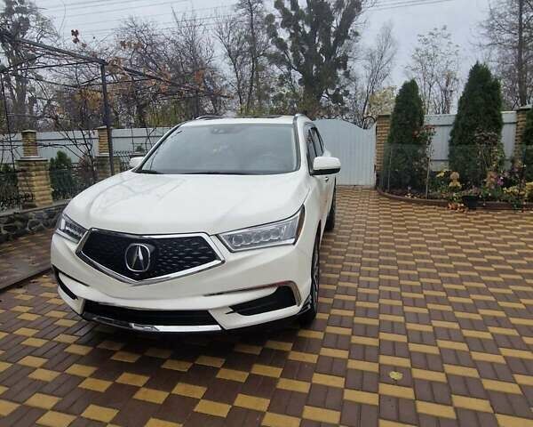 Белый Акура МДХ, объемом двигателя 3.47 л и пробегом 130 тыс. км за 20900 $, фото 1 на Automoto.ua