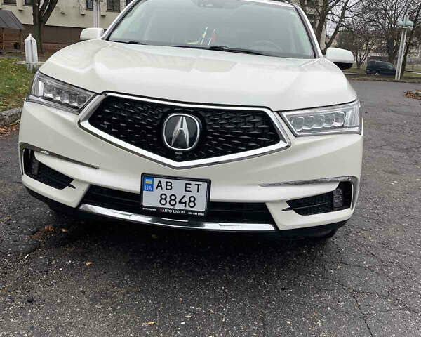 Белый Акура МДХ, объемом двигателя 3.47 л и пробегом 88 тыс. км за 28200 $, фото 1 на Automoto.ua