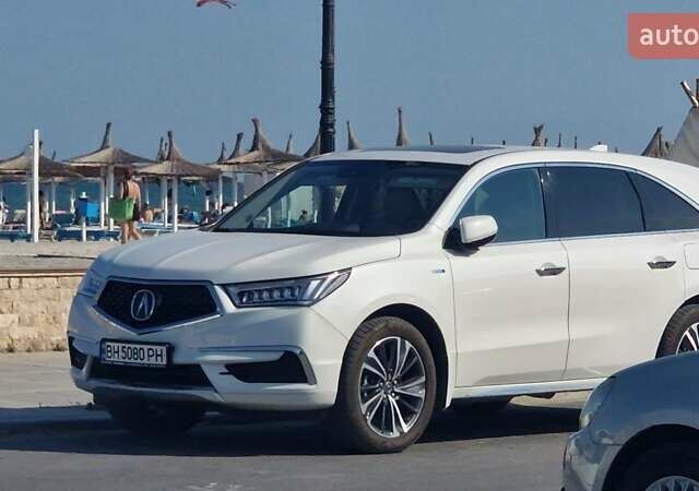Белый Акура МДХ, объемом двигателя 3 л и пробегом 47 тыс. км за 31500 $, фото 1 на Automoto.ua