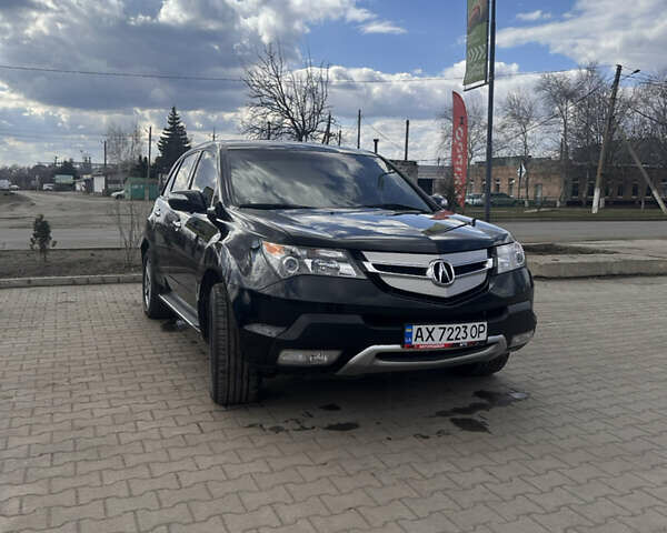 Черный Акура МДХ, объемом двигателя 3.66 л и пробегом 220 тыс. км за 11799 $, фото 1 на Automoto.ua