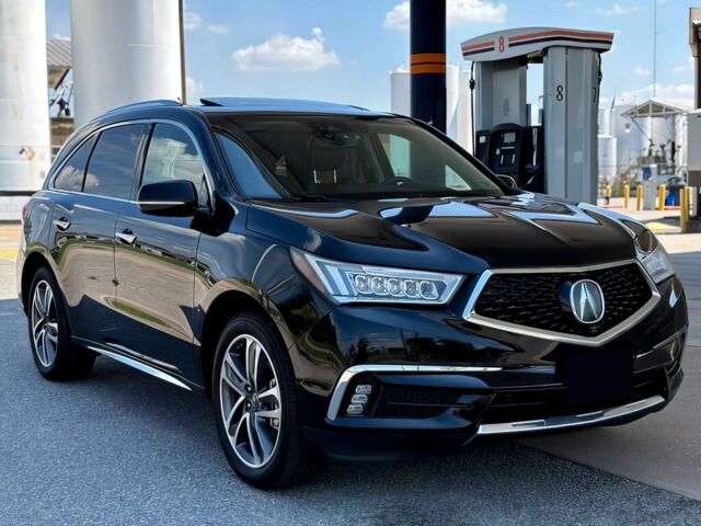 Черный Акура МДХ, объемом двигателя 3.5 л и пробегом 46 тыс. км за 14999 $, фото 1 на Automoto.ua