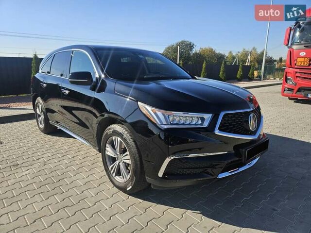 Черный Акура МДХ, объемом двигателя 3.47 л и пробегом 107 тыс. км за 30500 $, фото 1 на Automoto.ua