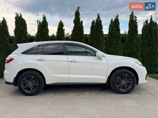 Белый Акура РДХ, объемом двигателя 3.47 л и пробегом 150 тыс. км за 18000 $, фото 1 на Automoto.ua