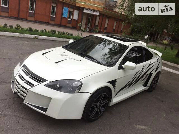 Білий Акура РСХ, об'ємом двигуна 2 л та пробігом 130 тис. км за 11800 $, фото 1 на Automoto.ua