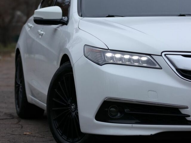 Білий Акура ТЛХ, об'ємом двигуна 2.4 л та пробігом 260 тис. км за 16999 $, фото 1 на Automoto.ua