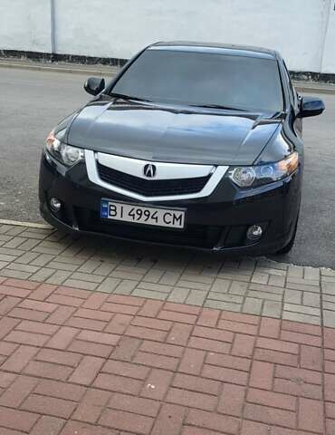 Черный Акура ТСХ, объемом двигателя 2.4 л и пробегом 265 тыс. км за 9500 $, фото 1 на Automoto.ua