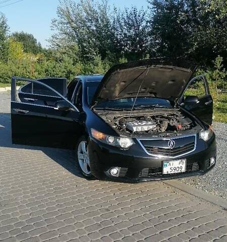 Черный Акура ТСХ, объемом двигателя 2.4 л и пробегом 210 тыс. км за 10000 $, фото 1 на Automoto.ua