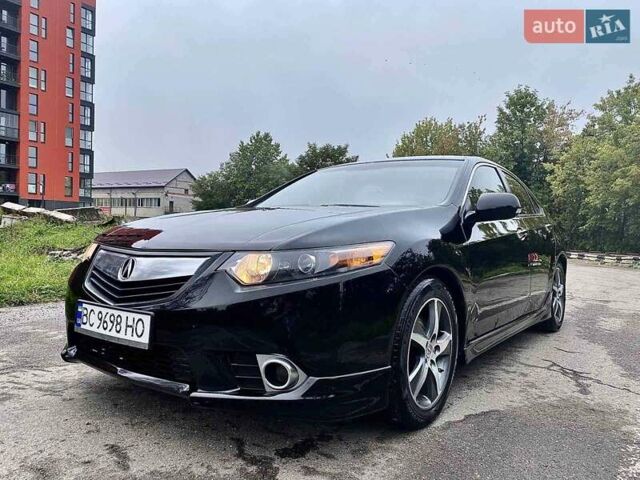 Черный Акура ТСХ, объемом двигателя 2.4 л и пробегом 186 тыс. км за 9100 $, фото 1 на Automoto.ua