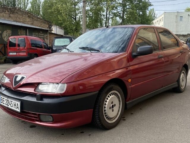 Красный Альфа 146, объемом двигателя 1.6 л и пробегом 218 тыс. км за 1750 $, фото 1 на Automoto.ua