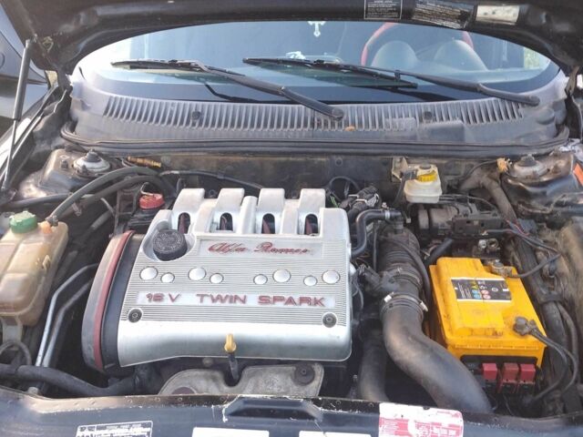 Черный Альфа 156, объемом двигателя 1.7 л и пробегом 331 тыс. км за 3000 $, фото 1 на Automoto.ua