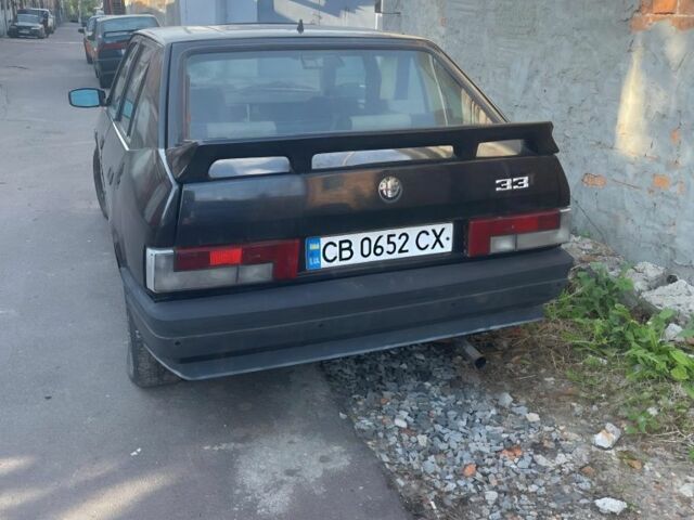 Черный Альфа 33, объемом двигателя 1.7 л и пробегом 285 тыс. км за 800 $, фото 1 на Automoto.ua