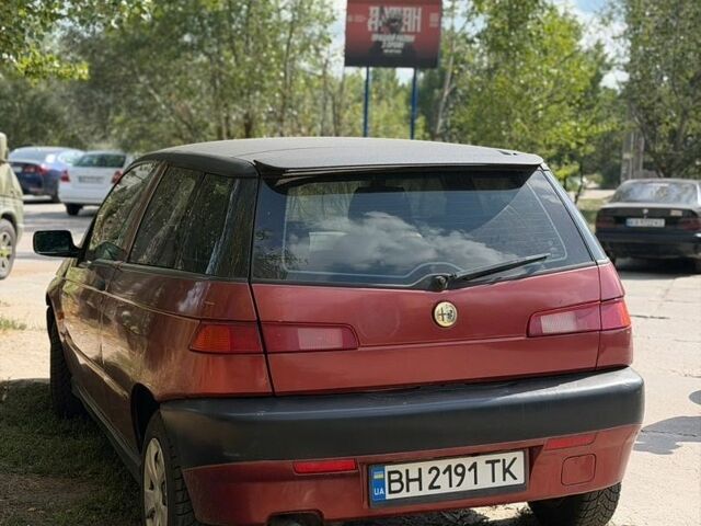 Красный Альфа Ромео 145, объемом двигателя 1.6 л и пробегом 237 тыс. км за 1898 $, фото 1 на Automoto.ua