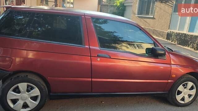 Красный Альфа Ромео 145, объемом двигателя 1.6 л и пробегом 100 тыс. км за 1900 $, фото 1 на Automoto.ua