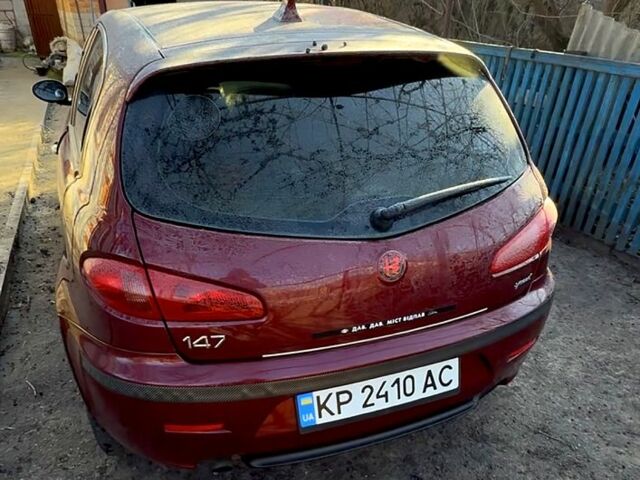 Красный Альфа Ромео 147, объемом двигателя 2 л и пробегом 209 тыс. км за 6500 $, фото 1 на Automoto.ua