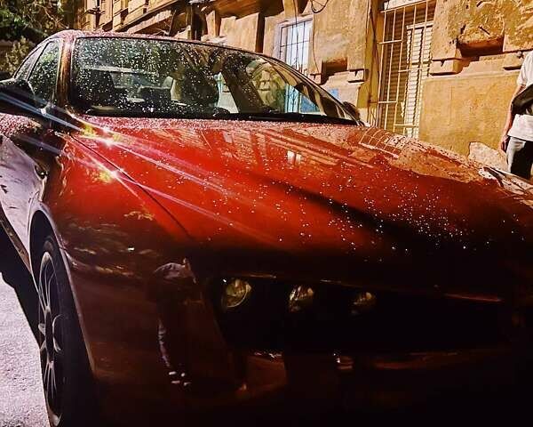 Червоний Альфа Ромео 159, об'ємом двигуна 2.2 л та пробігом 200 тис. км за 7500 $, фото 1 на Automoto.ua