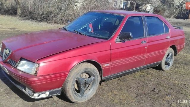 Красный Альфа Ромео 164, объемом двигателя 2 л и пробегом 333 тыс. км за 1000 $, фото 1 на Automoto.ua