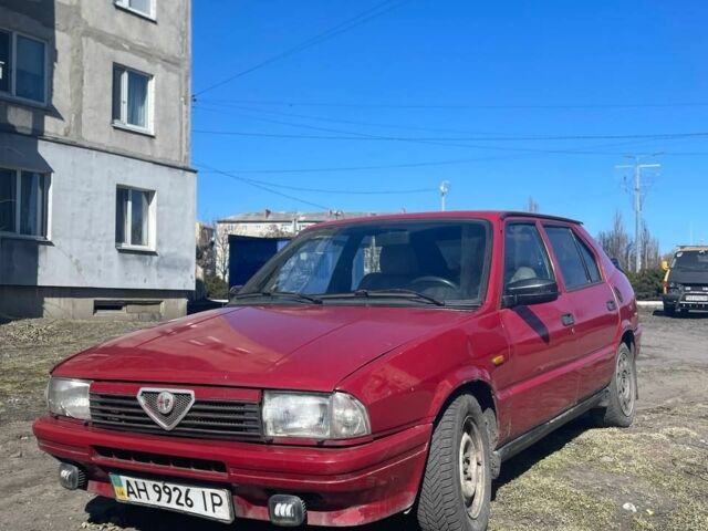 Красный Альфа Ромео 33, объемом двигателя 1.4 л и пробегом 100 тыс. км за 650 $, фото 1 на Automoto.ua